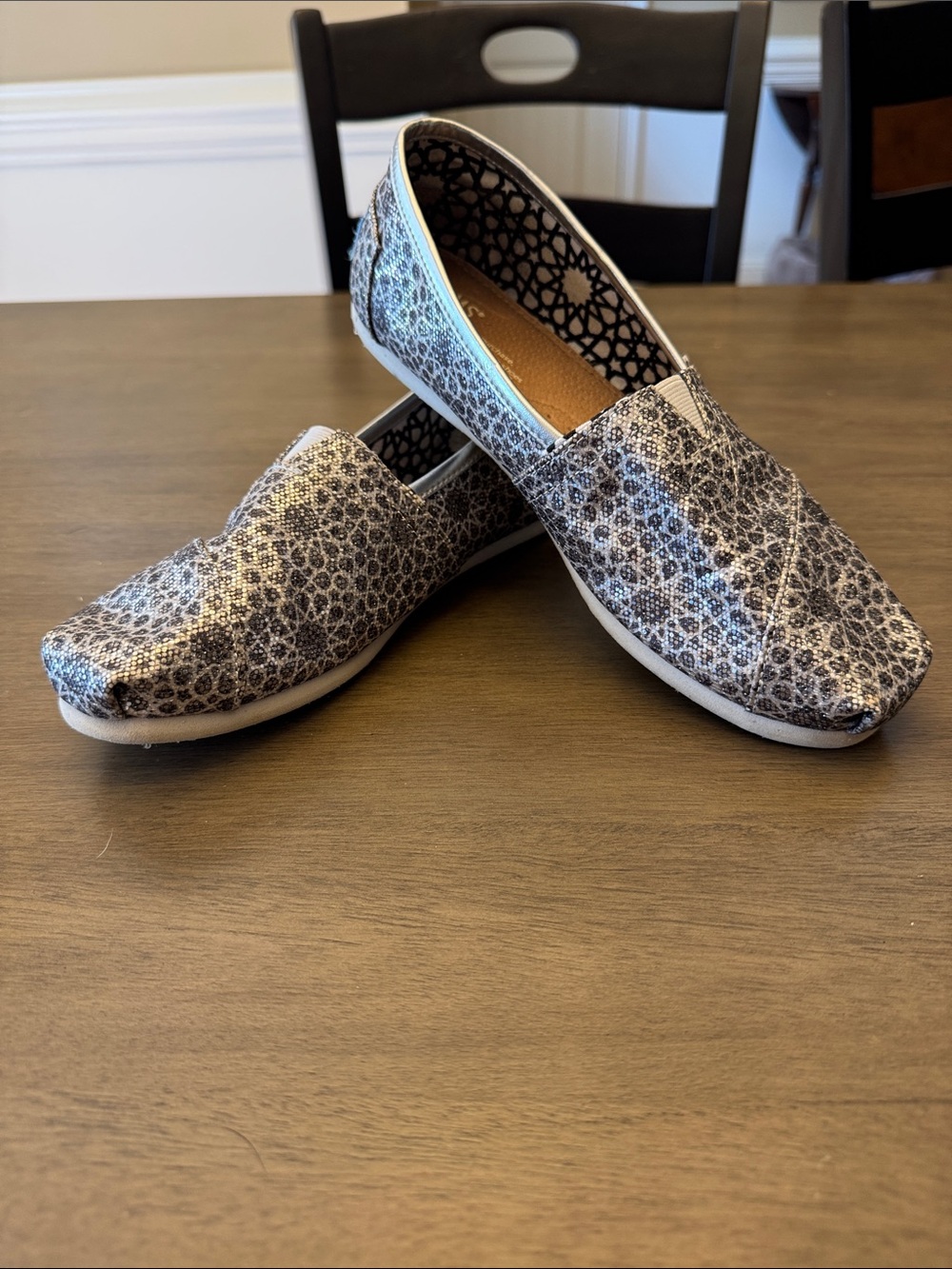 Toms Metallic Black and Silver Patterned Slip-Ons. 8W